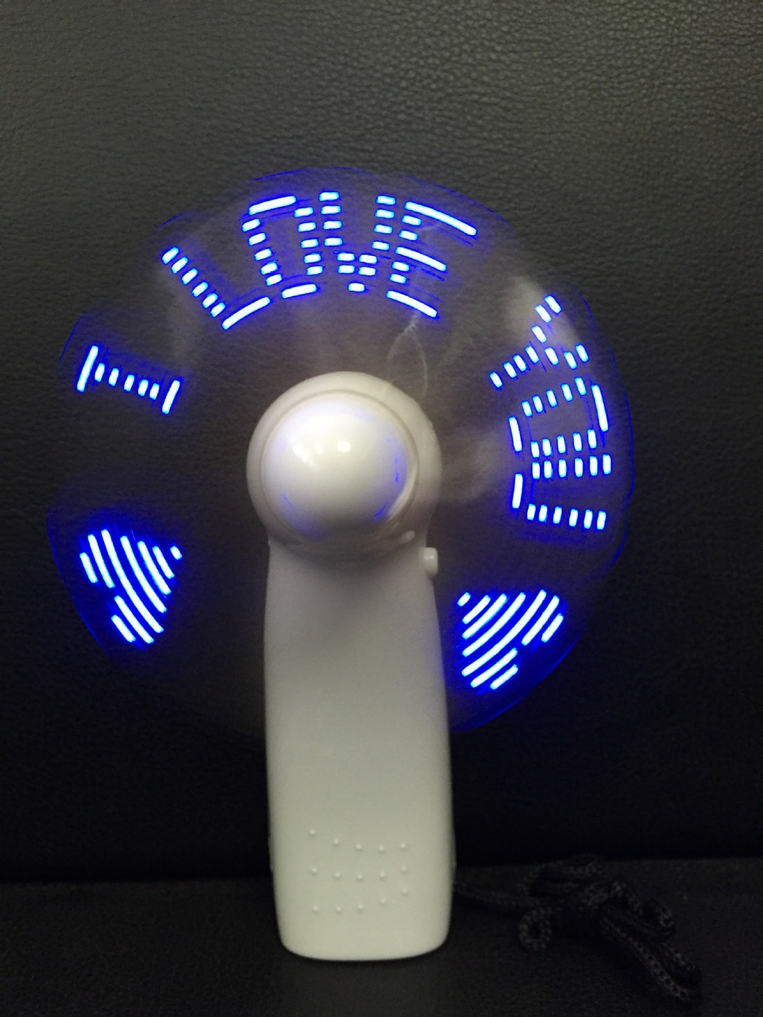 Handheld flashing fan